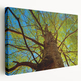 Raleigh skyline depicted in muted blue and gray tones on a large stretched canvas, suitable for kitchen wall decor.