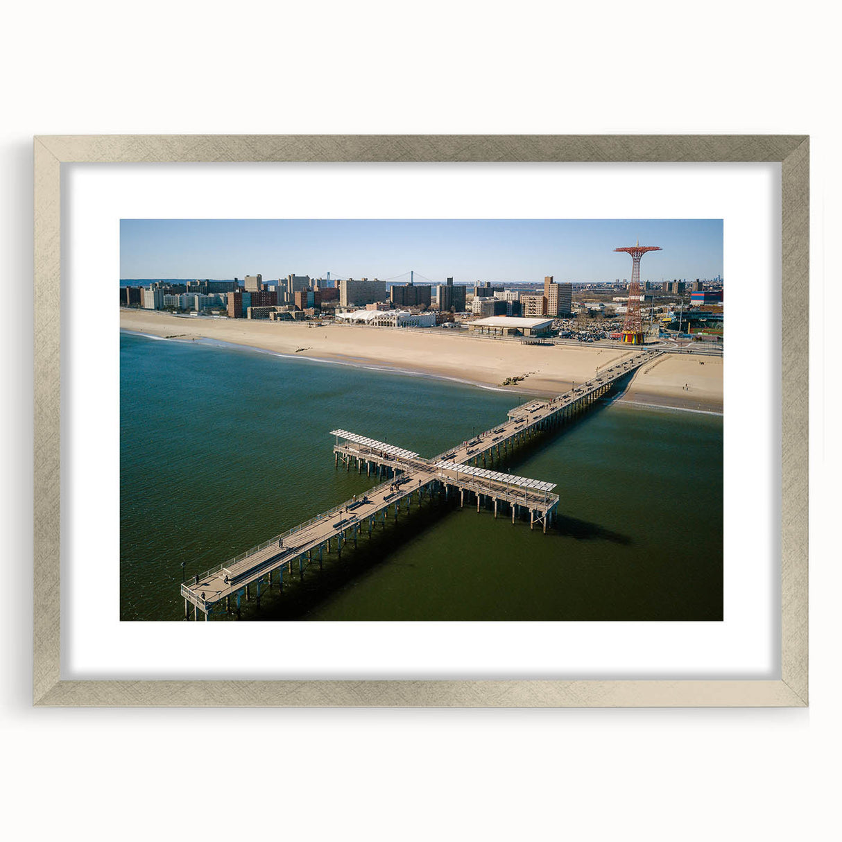 Textured abstract art print of Coney Island, featuring muted earth tones on a framed silver mat, suitable for bedroom art.