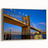Framed canvas of the Brooklyn Bridge in black and gold tones, ideal for bedroom wall art.