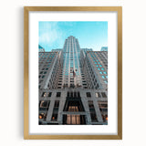 Extra large abstract art print of the Chrysler Building in textured gold and black tones, framed with a mat.