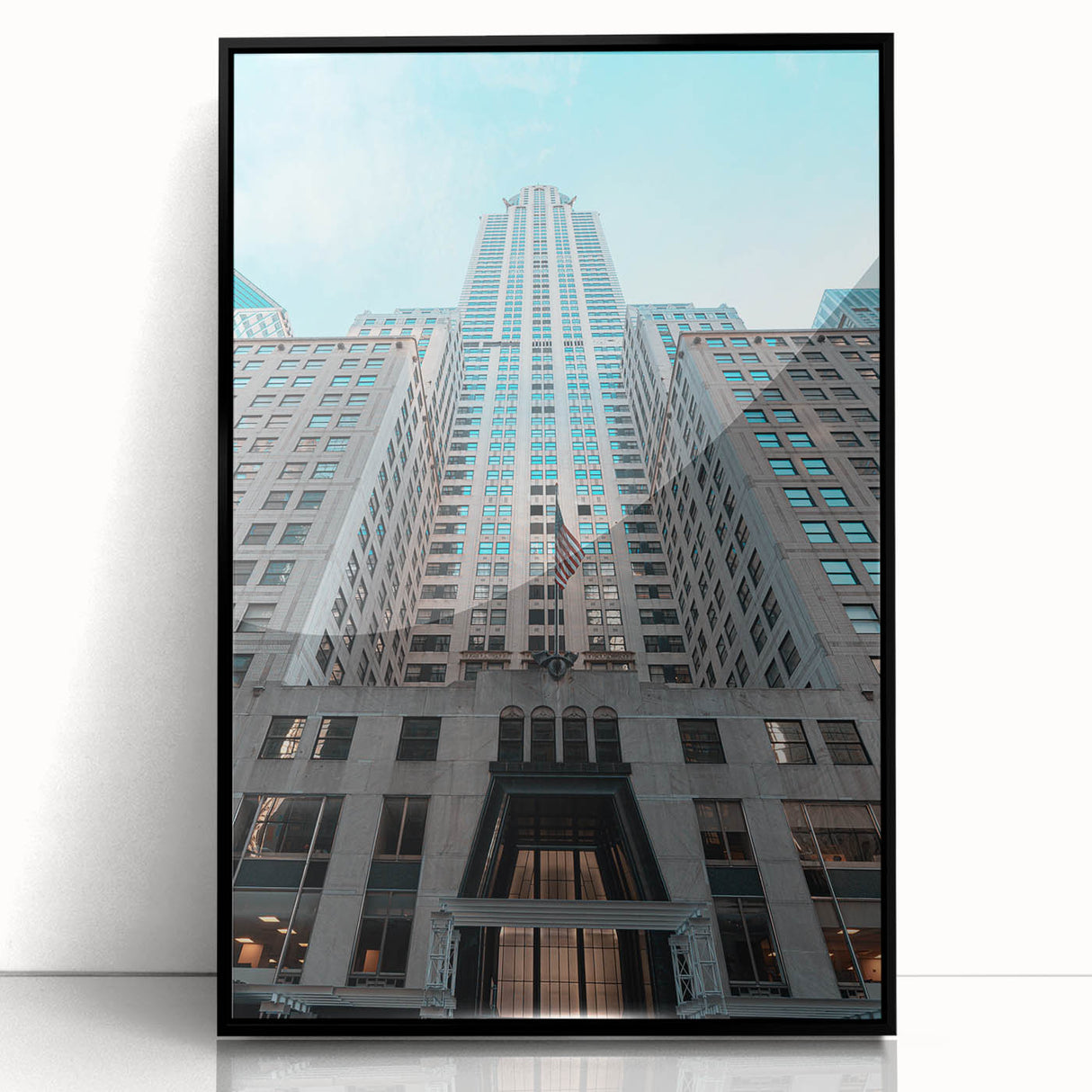 Large abstract wall art of the Chrysler Building in muted black and grey tones on a framed acrylic.