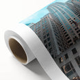 Art deco poster of the Chrysler Building in muted metallic tones on rolled canvas.