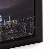Close-up of a black wall art canvas featuring a textured, colorful New York City Empire State Building.