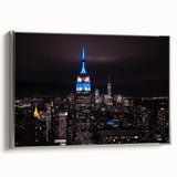 Framed canvas of a colorful New York City skyline landscape, featuring prominent black and silver tones.