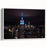 Vintage poster art of NYC Empire State Building in colorful hues on large framed canvas, ideal for living room decor.