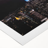 Art deco poster of the Empire State Building in monochrome shades on rolled canvas, suitable for dining room decor.