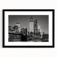 Extra large abstract art print of colorful, textured Manhattan skyline on a black framed canvas, ideal for living room decor.