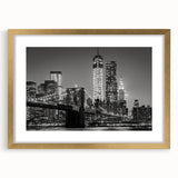 Extra large abstract art print of Manhattan skyline in textured gold frame, ideal for living room decor.