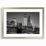 Textured art of abstract Manhattan skyline in muted gray and blue tones on a framed silver mat, ideal for bedroom art.
