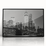 Large abstract wall art of Manhattan skyline in muted gray tones on a framed acrylic, ideal for modern living room decor.