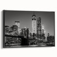 Black and white framed canvas of Manhattan skyline, ideal for bedroom wall art.
