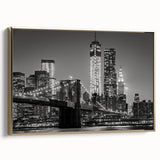 Framed canvas depicting a vintage-style Manhattan skyline in black and gold tones, ideal for bedroom wall art.