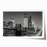 Large rolled canvas print of Manhattan skyline in muted gray and blue tones, suitable for dining room wall art.