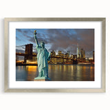 Textured art print of the Statue of Liberty in abstract style with muted green and gray tones on a framed silver canvas.