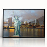 Large abstract wall art of the NYC skyline featuring the Statue of Liberty in muted gray tones on a framed acrylic panel.