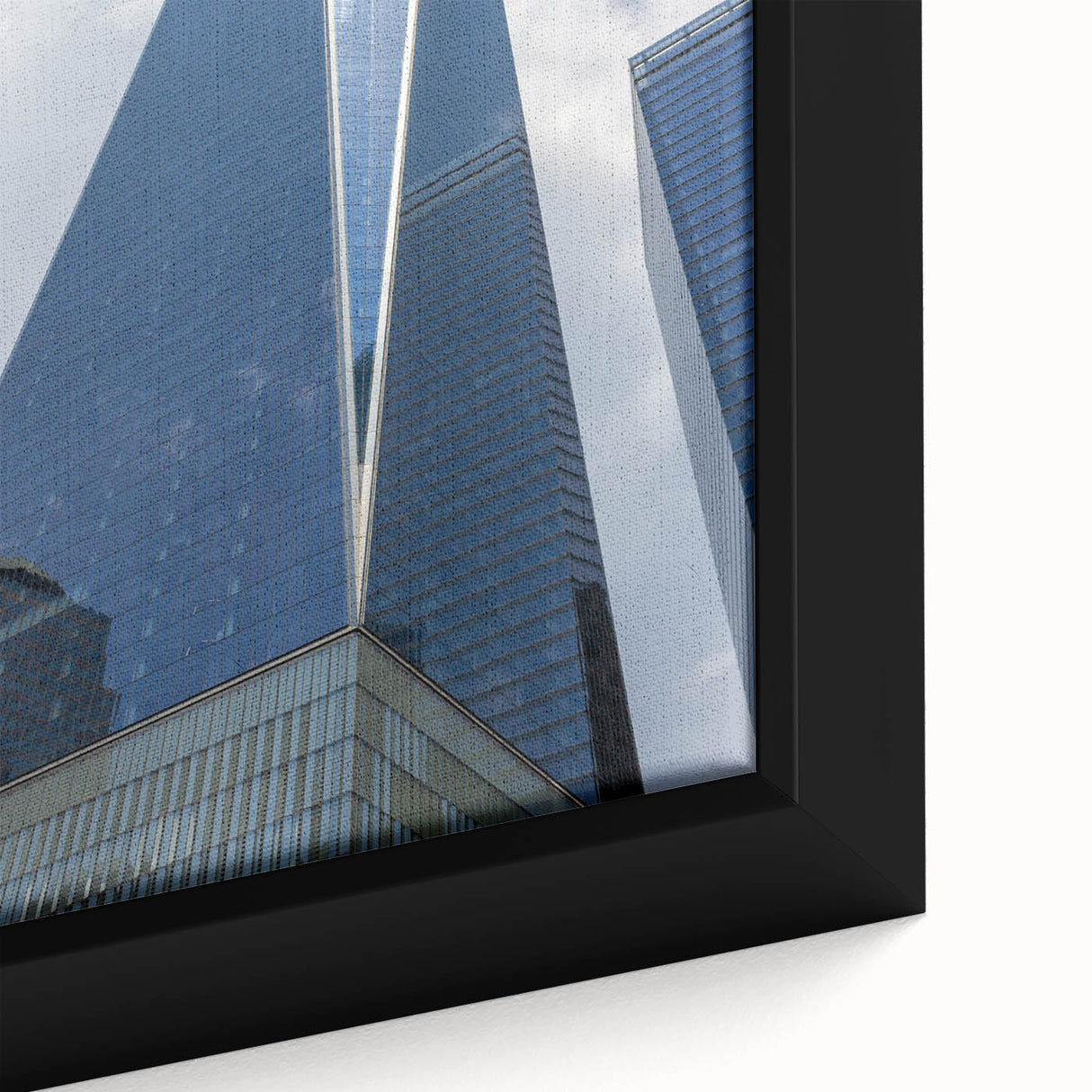 Black wall art featuring a textured depiction of the NYC Trade Center in vibrant colors on a large framed canvas.