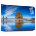 Acrylic print of Cannon Beach, Oregon, in muted gray tones, ideal for bedroom or dining room decor.
