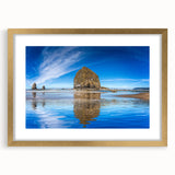 Extra large abstract art print of Cannon Beach, Oregon, in muted earth tones, framed in gold, ideal for living room decor.