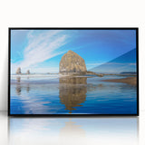 Large abstract wall art of Cannon Beach in muted grays and blues on a framed acrylic, ideal for modern living room decor.