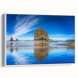 Vintage poster art of Cannon Beach, Oregon in colorful hues on a large framed canvas, ideal for living room decor.