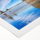 Art deco poster of Cannon Beach, Oregon, in muted gray and blue tones on rolled canvas, suitable for dining room wall art.