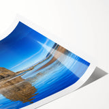 Extra large rolled print of Cannon Beach, Oregon, featuring muted tones and line art flowers.