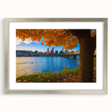 Textured abstract art print depicting Portland, Oregon, in muted earth tones on a silver-framed mat, ideal for bedroom art.
