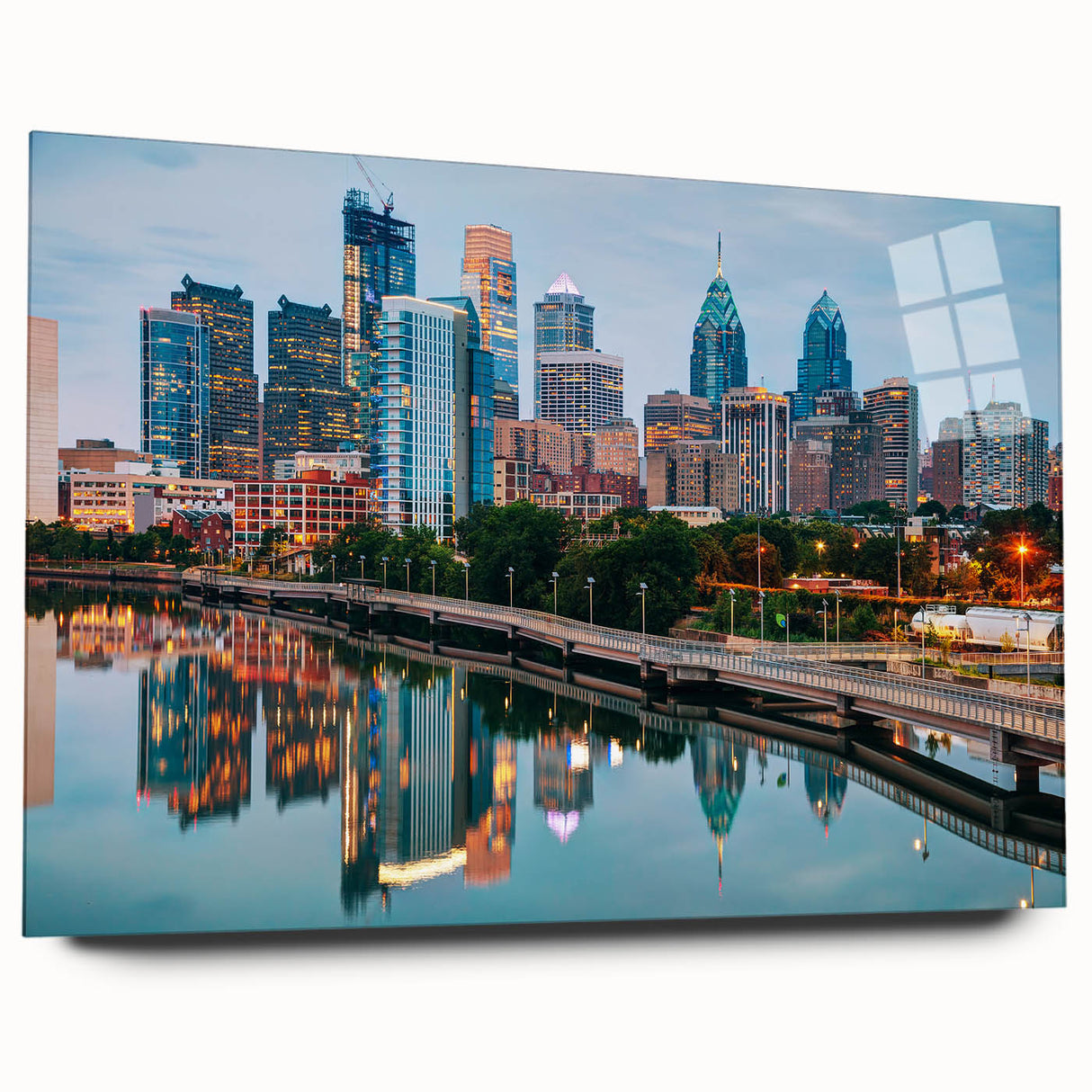 Large abstract depiction of the Philadelphia skyline in muted blue and gray tones on acrylic glass.