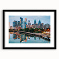 Abstract art print of Philadelphia skyline in vibrant colors on a large textured canvas, ideal for living room decor.
