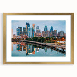 Extra large abstract art print of Philadelphia skyline in textured gold frame, suited for living room decor.