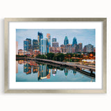 Textured art print depicting an abstract Philadelphia skyline in muted gray and blue tones, framed in silver.