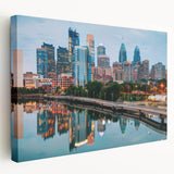 Large art depicting the Philadelphia skyline in muted gray and blue tones on stretched canvas, ideal for kitchen wall art.