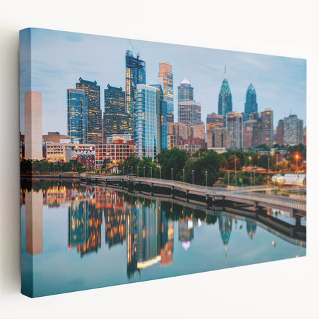 Large art depicting the Philadelphia skyline in muted gray and blue tones on stretched canvas, ideal for kitchen wall art.