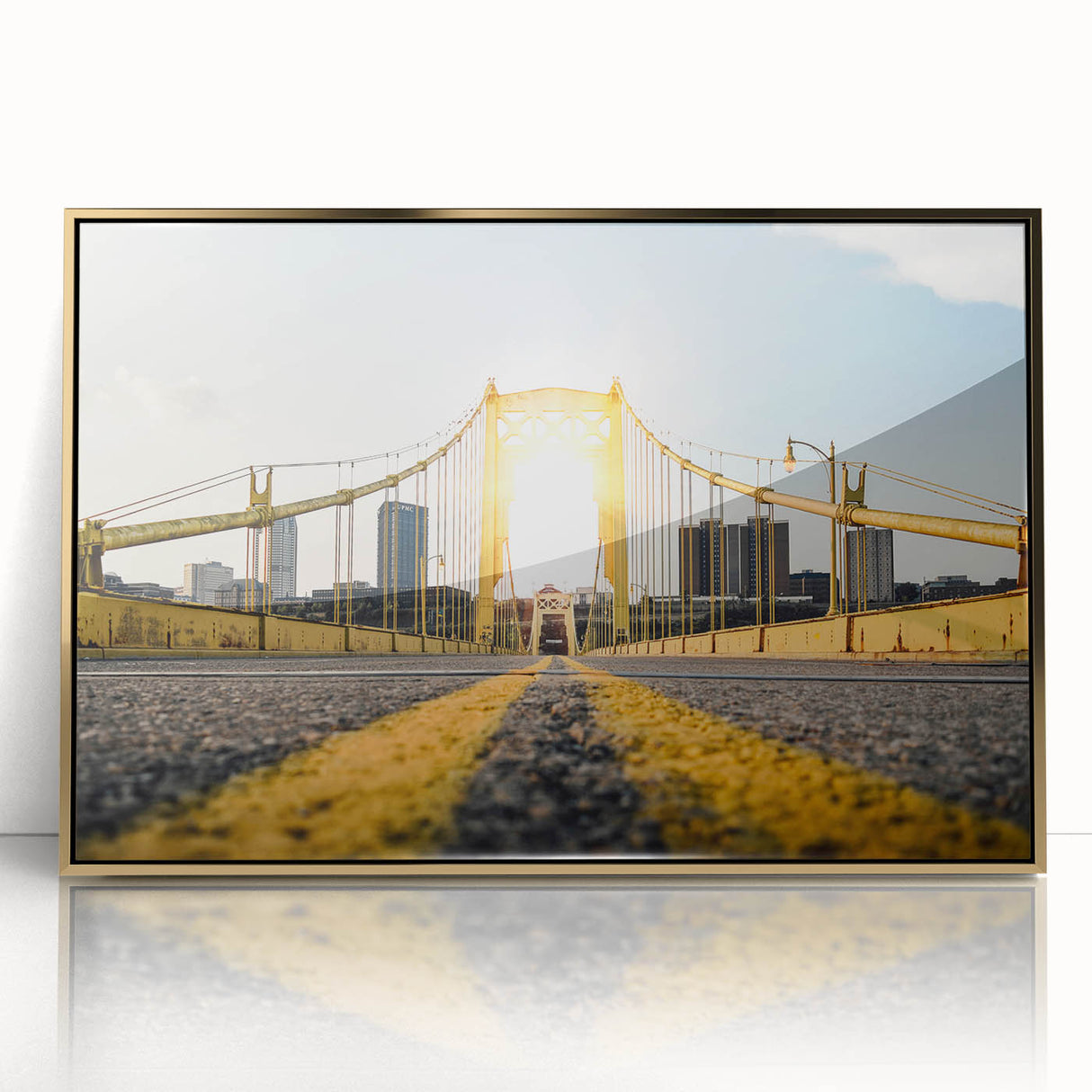 Framed acrylic print of Pittsburgh skyline in gold and black tones, suitable for modern art wall decor.