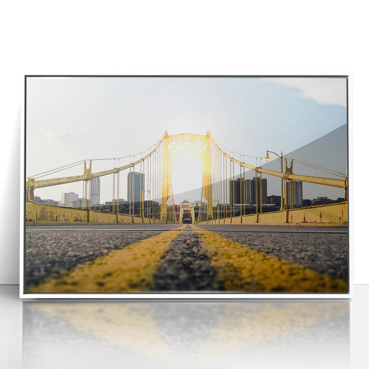 Art Deco poster of Pittsburgh skyline in muted gold and black on white framed acrylic, suitable for modern art wall decor.
