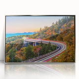 Mid-century modernist art depicting South Carolina scenery in muted earth tones on a silver-framed acrylic print.