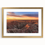 Extra large abstract art print of South Dakota Badlands in textured gold frame, featuring earthy tones.