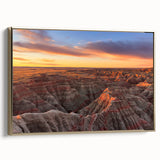 Framed canvas of a vintage-style Badlands landscape in black and gold tones, ideal for bedroom wall art.