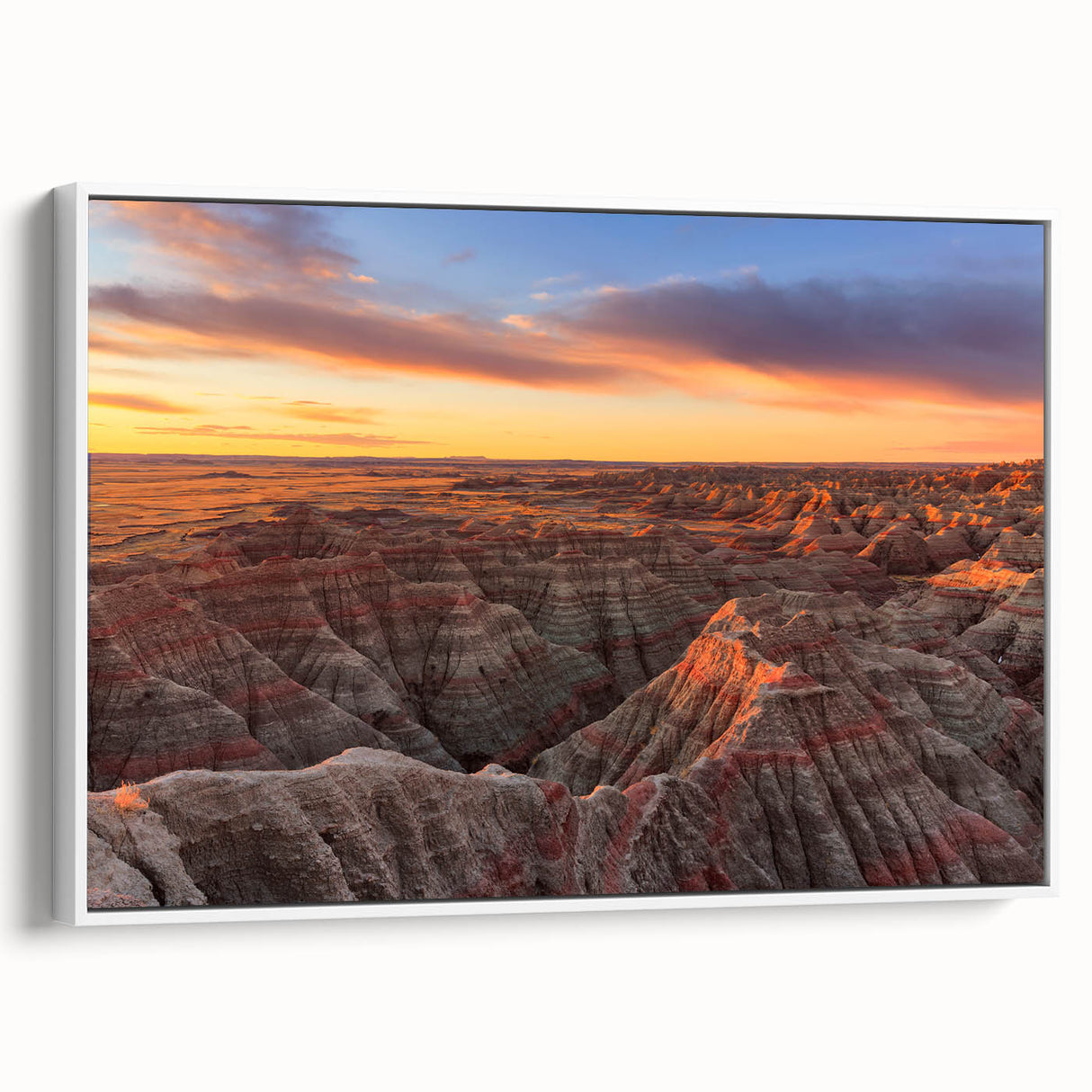 Vintage poster art of South Dakota Badlands on a framed canvas, featuring a colorful palette, ideal for living room decor.
