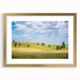 Extra large abstract art print depicting South Dakota scenery in textured gold hues, framed with a mat.