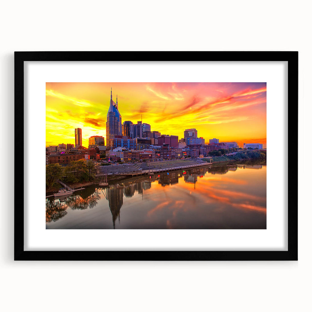 Abstract art print of Nashville skyline in vibrant colors on a large framed canvas, ideal for living room decor.