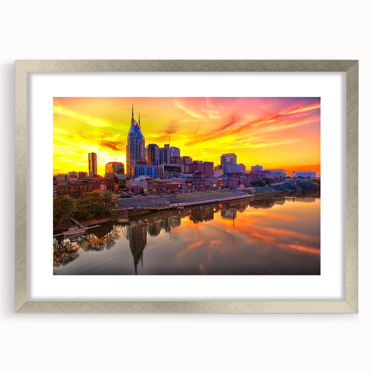 Textured abstract art print of Nashville skyline in muted blue tones on a framed silver mat, ideal for bedroom art.