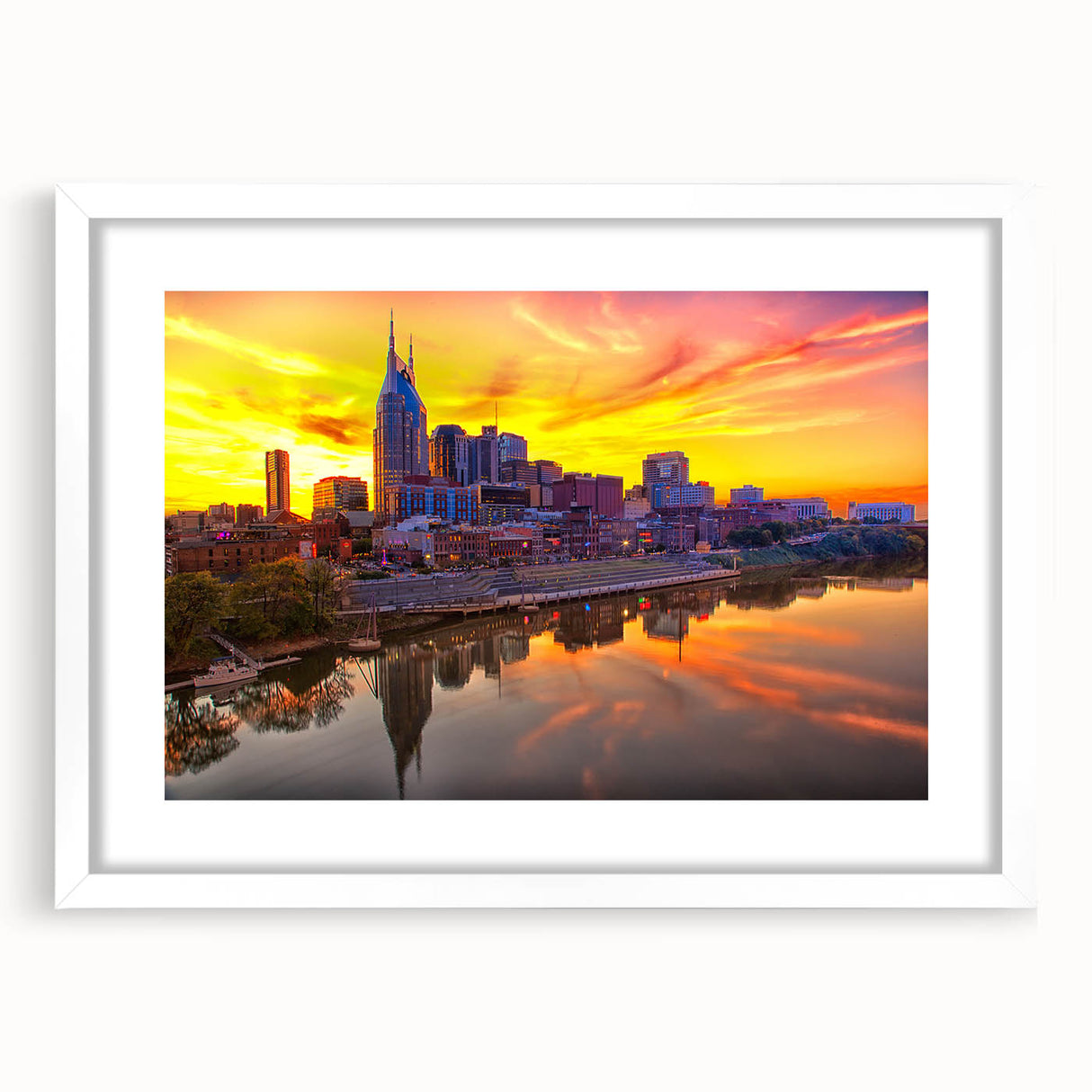 Abstract art print of Nashville skyline in muted gray and blue tones on a framed canvas.