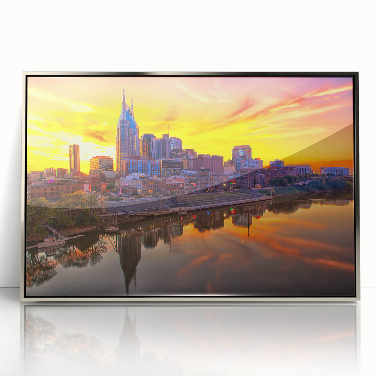 Framed acrylic print of Nashville skyline in muted gray and silver tones, embodying mid-century modernist style.