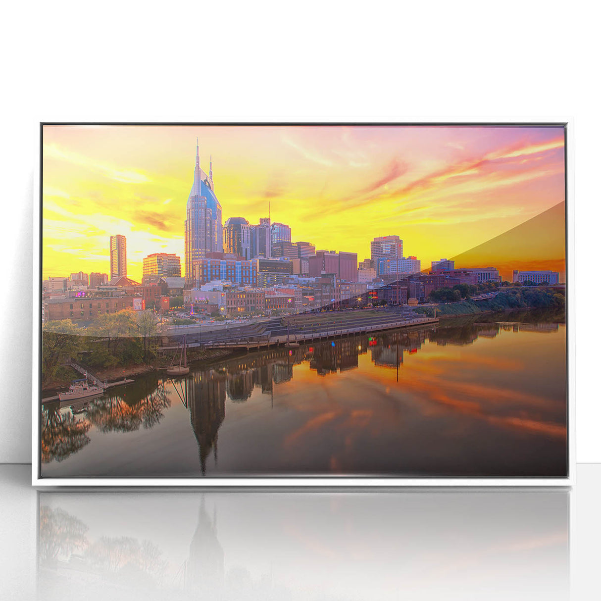 Framed acrylic print of Nashville skyline in art deco style with pastel blue and pink shades.