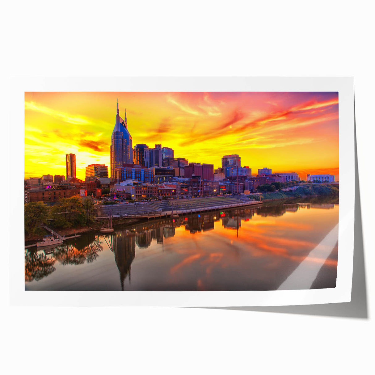 Rolled print of Nashville skyline in muted gray and blue tones, ideal for dining room wall art.