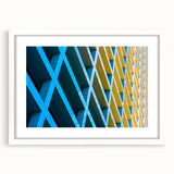 Abstract art print of Houston skyline in muted gray and blue tones on a framed white mat, ideal for dining room decor.