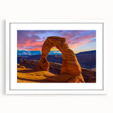 Abstract art print of Arches National Park in muted earth tones on a white framed canvas, ideal for dining room decor.