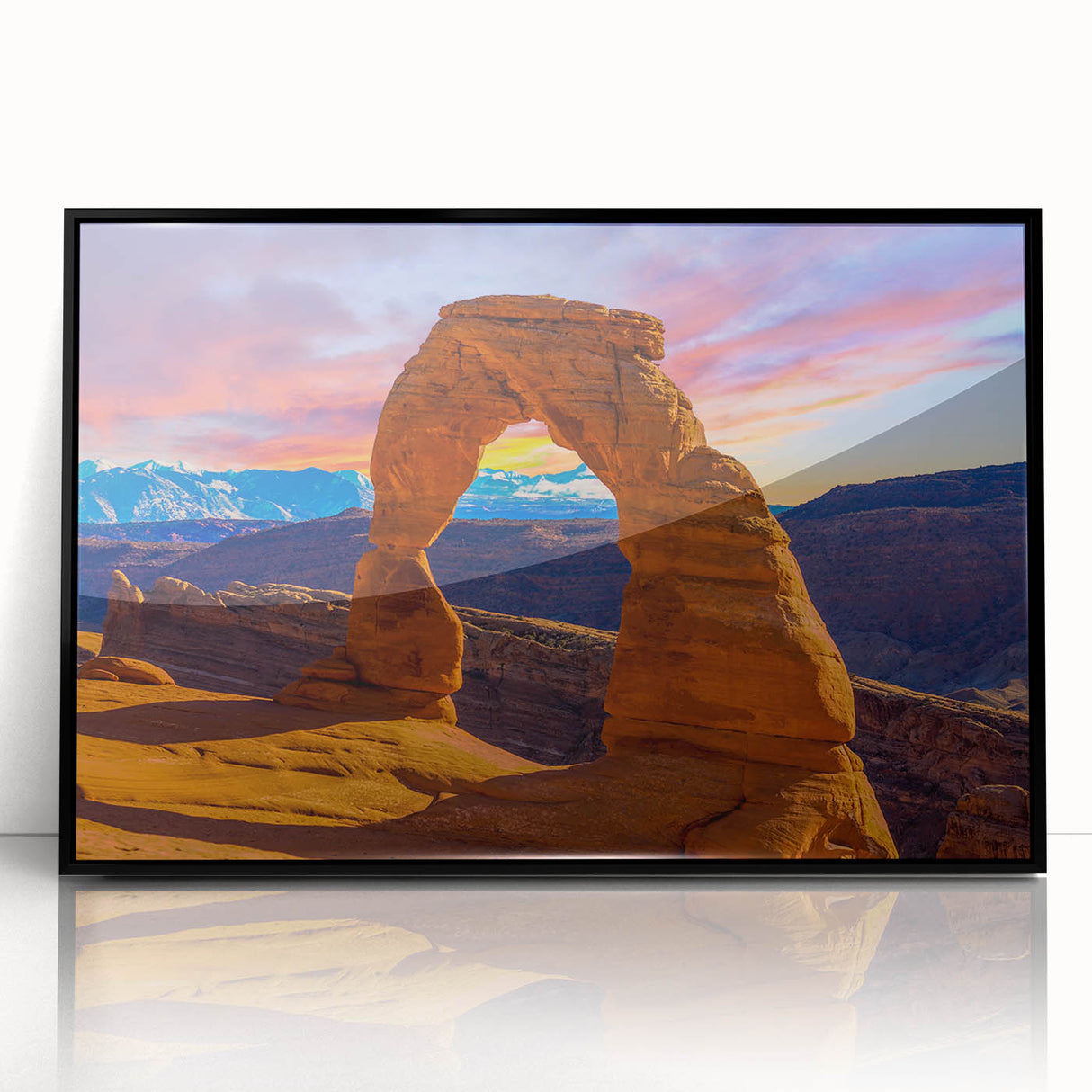 Large abstract wall art depicting Arches National Park in Utah with vibrant red and orange tones on a framed acrylic.