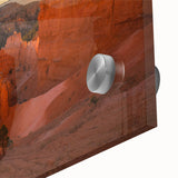 Large abstract depiction of Bryce Canyon in vibrant orange and red tones on acrylic glass, ideal for dining room art.
